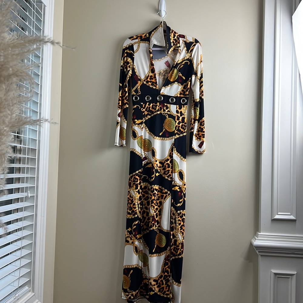Sexy Classy Spree Maxi Dress. Deep neck line and a long split for each leg.